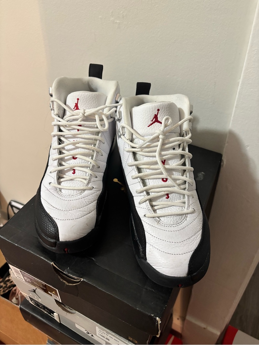 Jordan Men’s White and Black Sneakers with Red Logo
